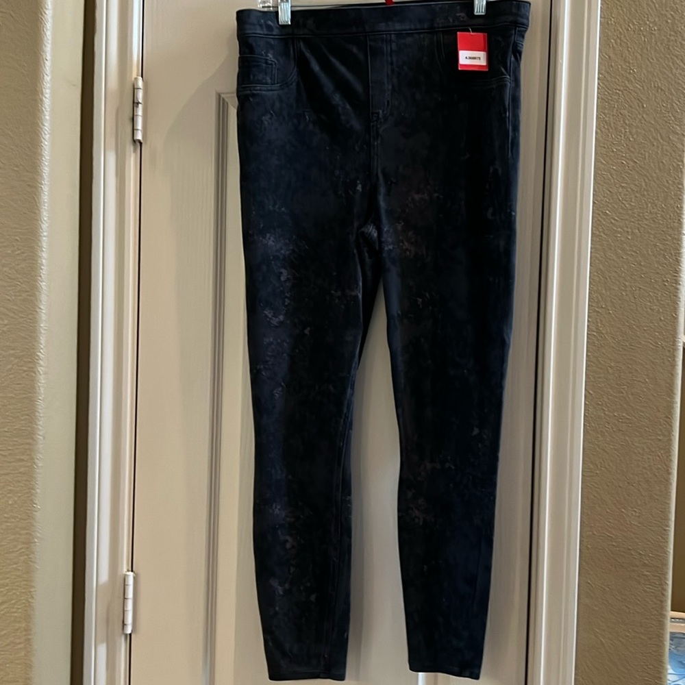 Brand new Women’s size 1X SPANX faded black jeggings with camo pattern.